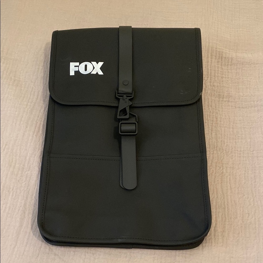 Rains Fox Black Laptop Backpack. Unisex model